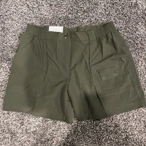 Women’s World Wide Sportsman green shorts.